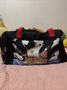 Black and Red Graphic Travel Duffle Bag with Ship Print